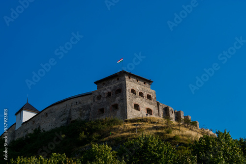 Stone medieval fortress on the hill in Hungary photo