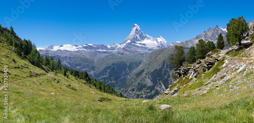The panorama of swiss walliser alps with the Matterhorn peak over the Mattertal valley and Zermatt.