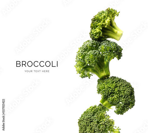 Creative layout made of green broccoli on the white background. Flat lay. Food concept. Macro concept. 