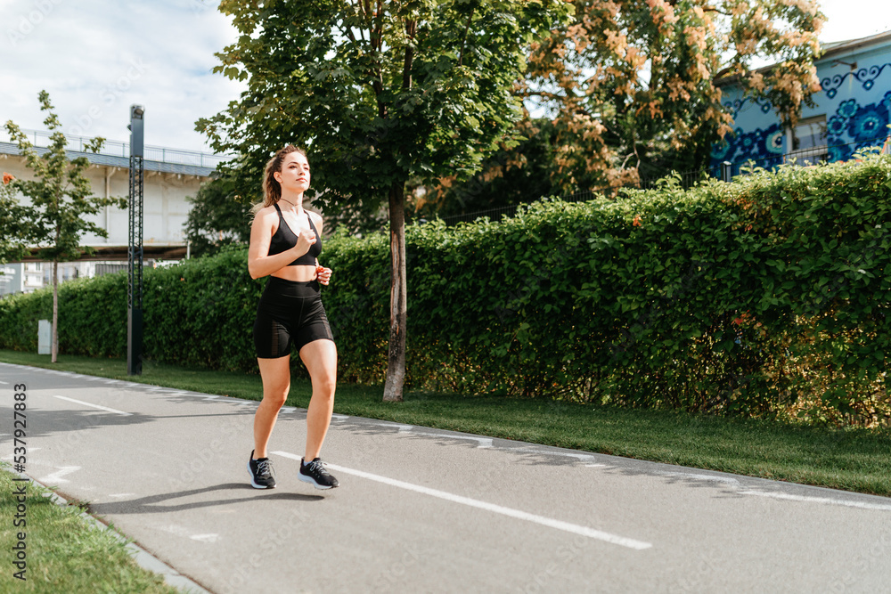 Woman Running In Neighbourhood. Woman Running In Neighbourhood.