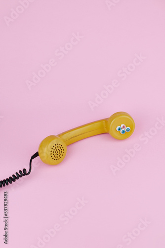 Telephone receiver with eyes photo