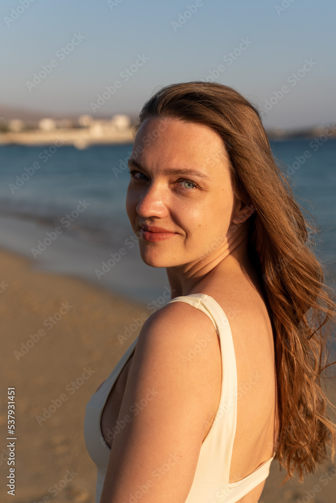 Woman In The Beach At Sunset Woman In The Beach At Sunset