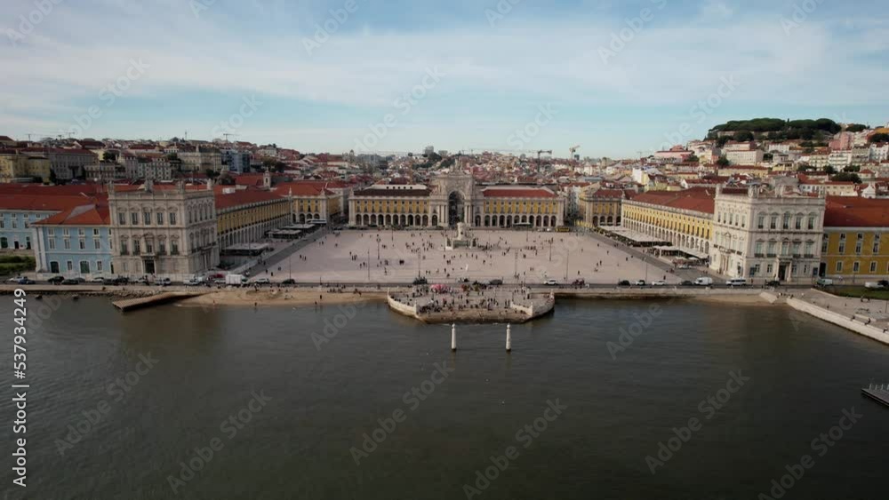 Aerial view of pedestrians at Praca do Comercio in Lisbon, Portugal with Rua Augusta in the far background Aerial view of pedestrians at Praca do Comercio in Lisbon, Portugal with Rua Augusta in the far background