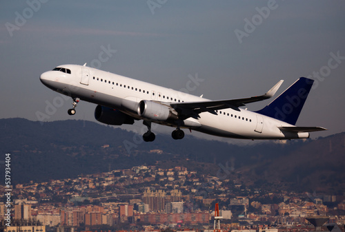 Airplane takes off from airport Barcelona. High quality photo