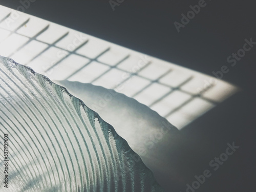 A minimalistic, fine art approach to the glassware with shadowplay