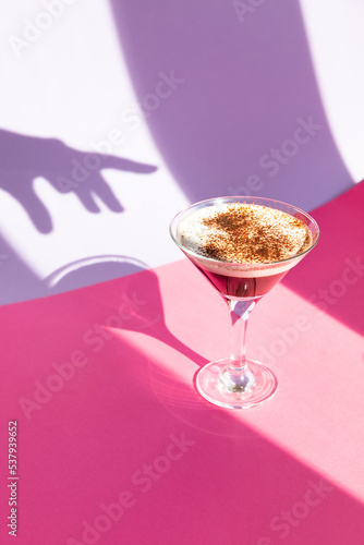 Coffee cocktail on purple background photo