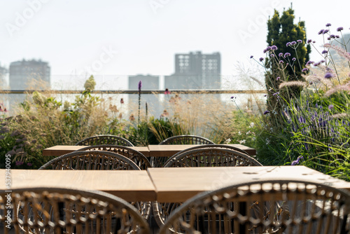 Great sunny interior of modern rooftop cafe