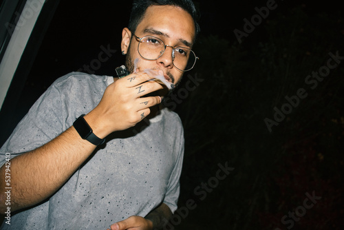 Smoking at night photo