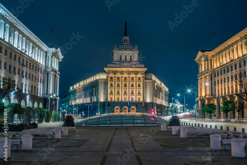 Fototapeta Naklejka Na Ścianę i Meble -  Largo ensemble, National Assembly and city lights at night, Sofia, Bulgaria