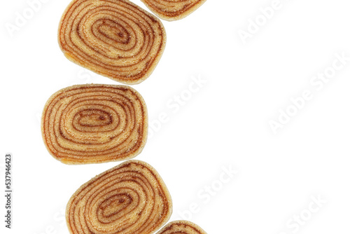 Several slices of bolo de rolo (roll cake) forming a semi circle_top view (PNG). photo