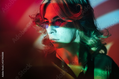 Transgender model under colorful projection