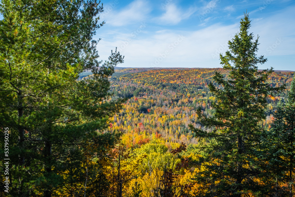Fototapeta premium Bird's eye view lookout over fall color trees and golf course in Bancroft, Ontario, Canada