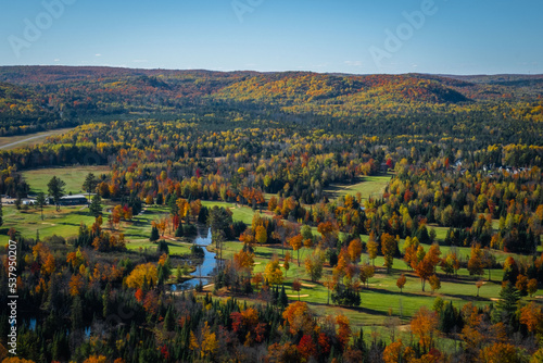 Bird's eye view lookout over fall color trees and golf course in Bancroft, Ontario, Canada