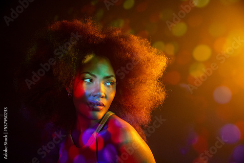 African American model under bright light photo