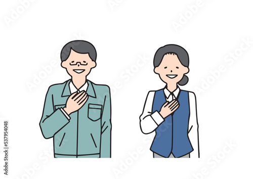 
お任せください、と胸に手を置く工務店の男性と受付の女性
