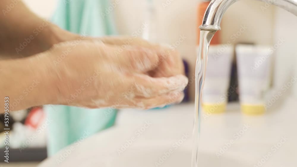 Hygienic human hand washing their hands.
Washing hands. Washing hands with hand soap.
Hygienic human hand washing their hands.
Washing hands. Washing hands with hand soap.