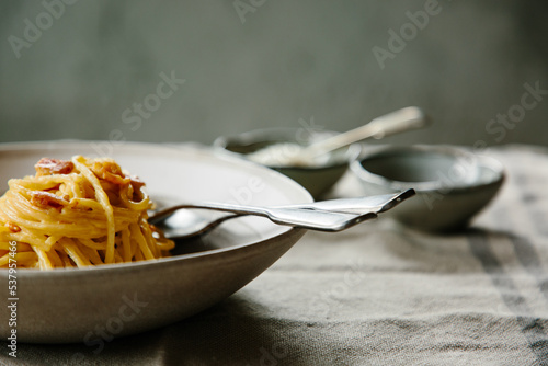 A dish of spaghetti carbonara photo