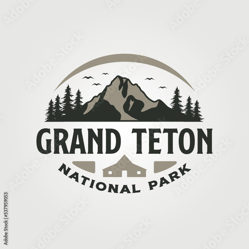 Photo grand teton vintage logo vector illustration design, travel adventure logo desig