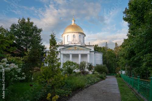 View of the St. Michael's Cathedral of the Holy Dormition Pskov-Pechersk Monastery on a sunny summer day, Pechory, Pskov region, Russia photo