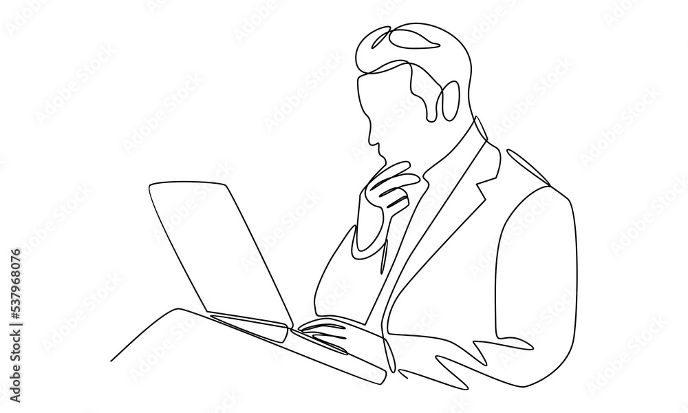 Continue line of man at his desk is working on the laptop computer
