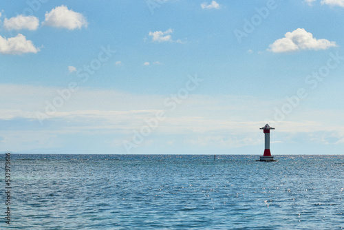 Lighthouse over the horizon