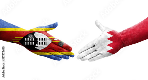 Handshake between Bahrain and Eswatini flags painted on hands, isolated transparent image.