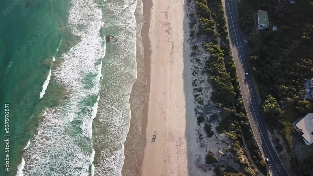 Drone aerial over The great ocean road beach with penis drawn on the sand Drone aerial over The great ocean road beach with penis drawn on the sand