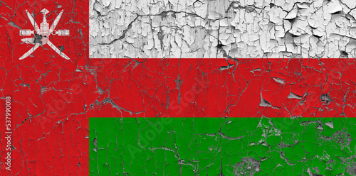 3D Flag of Oman on an old stone wall background.