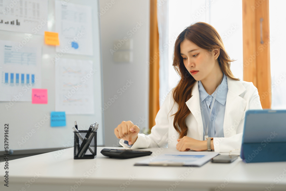 Successful business concept, Businesswoman is calculated investment to thinking about new project Successful business concept, Businesswoman is calculated investment to thinking about new project