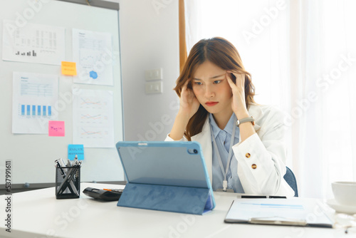 Business concept  Businesswoman feeling stressed while working hard to thoughtful about new project