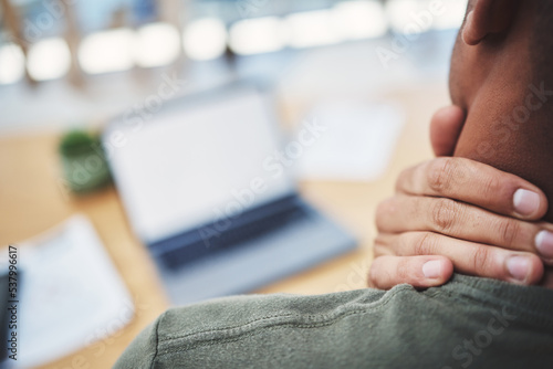 Photography Hand, neck pain and discomfort with a freelance man at work on a laptop in his office from above