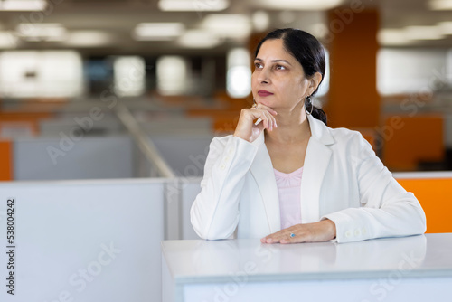 Photography Beautiful woman leaning on table and looking away