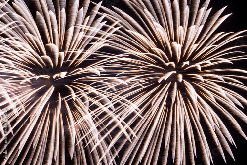 Close-up of colorful fireworks on black background