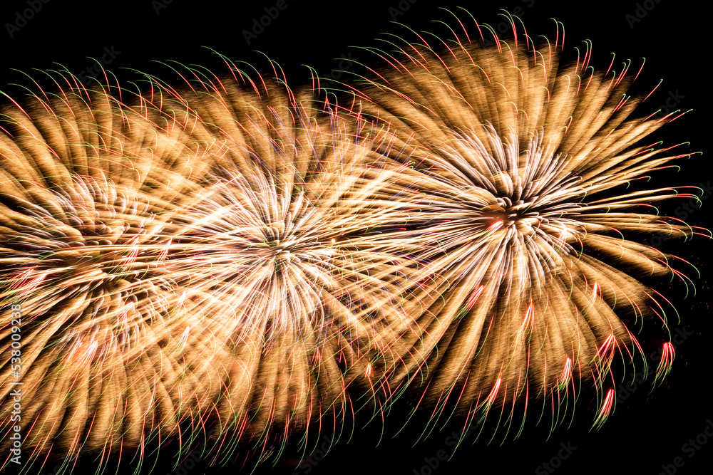 Obraz premium Close-up of colorful fireworks on black background