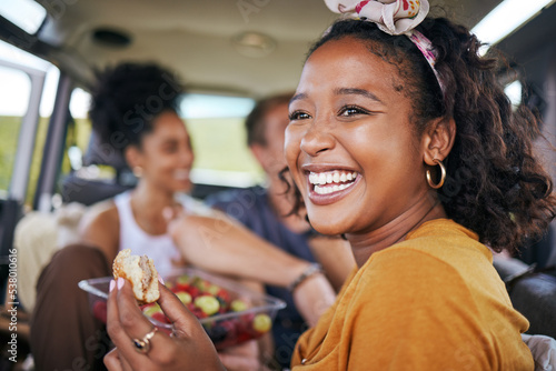 Tablou canvas Happy black woman, smile and eating on road trip adventure with friends in travel for summer vacation or journey
