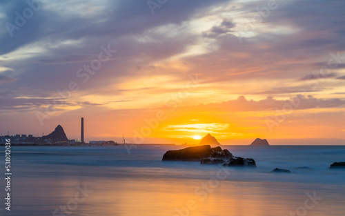 New Plymouth Cityscape Sunset on the Beach photo