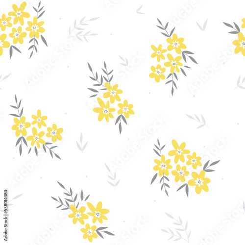 Stylish floral seamless pattern with cute little yellow flowers. Elegant fabric design in hand-drawn style. Floral print design for textiles, wrapping paper, gift paper, fabric.