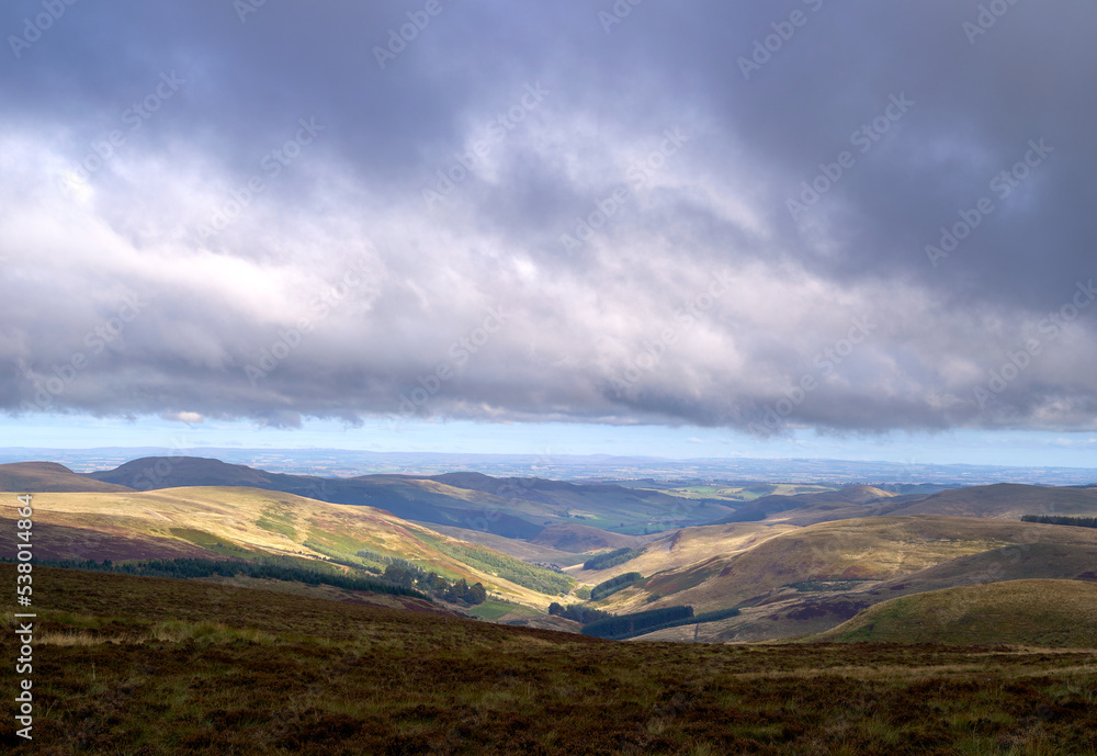 Views of Calroust Burn over the Scottish border from near Windy Gyle in the Cheviot Hills in Northumberland, England