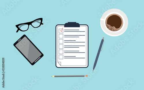top view of the desktop. empty space with coffee cup, glasses, laptop. goal planning.	
