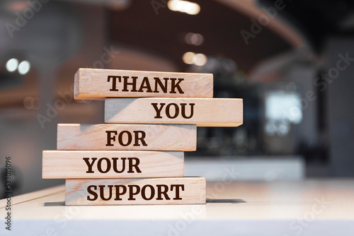 фотографія Wooden blocks with words 'Thank you For Your Support'.