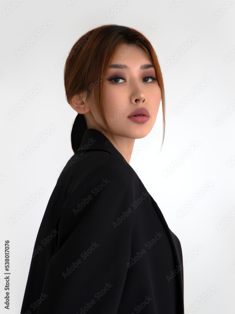 Fototapeta premium Young Woman with Clean Fresh Skin. Beauty portrait of Asian women on light and shadow background. Asian women portrait.