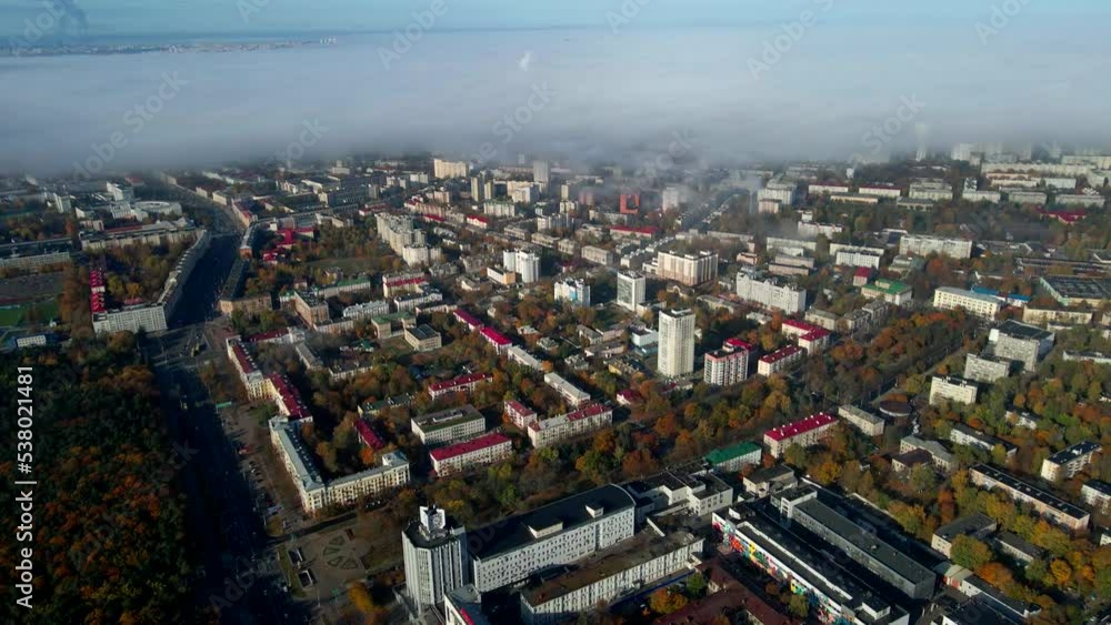 custom made wallpaper toronto digitalDrone flight over the autumn city through the fog on a sunny morning.
