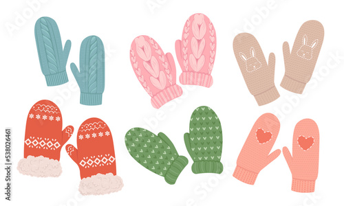 Set of wool knitted mittens. Cozy winter gloves. Vector flat illustration. Cute mittens. Winter clothes. 