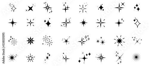 Set of sparkles star icons.Star icon.Bright firework.Light icon set.Flash,shine sparkle icon,glare,blink star.Black star icons isolated on white background