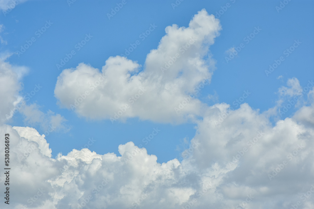 White clouds against blue sky for a backgrounds. White clouds against blue sky for a backgrounds.