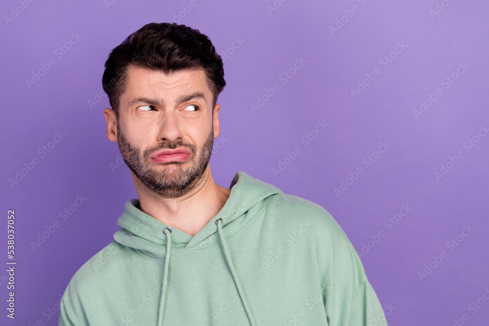 Closeup photo of youngster funny student man bristle brunet pouted lips look empty space unsatisfied dont like information isolated on violet color background