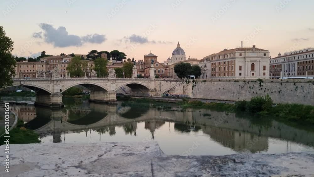 Tracking right steady cam view of Sant'Angelo castle and bridge above Tiber River at morning in Rome, Italy. Tracking right steady cam view of Sant'Angelo castle and bridge above Tiber River at morning in Rome, Italy.