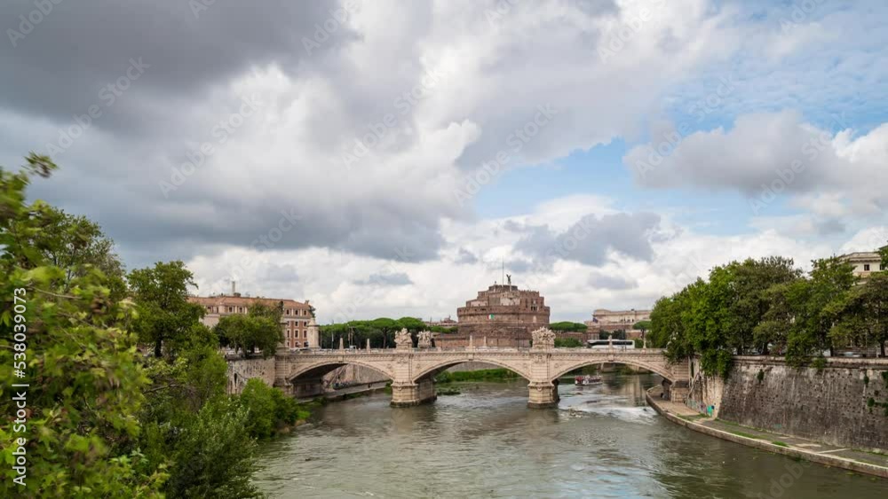 Time lapse video with moving clouds above medieval St. Angelo castle and Vittorio Emanuele II Bridge over Tiber river in Rome, Italy Time lapse video with moving clouds above medieval St. Angelo castle and Vittorio Emanuele II Bridge over Tiber river in Rome, Italy