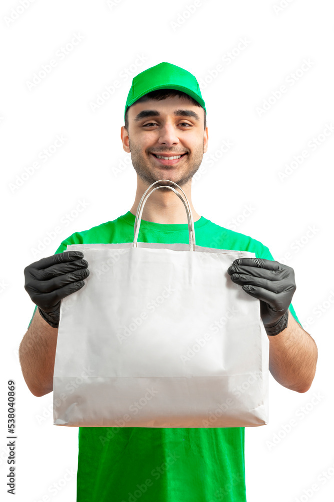 Delivery man with paper bag. Courier in uniform cap and t-shirt, gloves service fast delivering orders. Young guy holding a cardboard package. Character on isolated white background for mockup design Delivery man with paper bag. Courier in uniform cap and t-shirt, gloves service fast delivering orders. Young guy holding a cardboard package. Character on isolated white background for mockup design