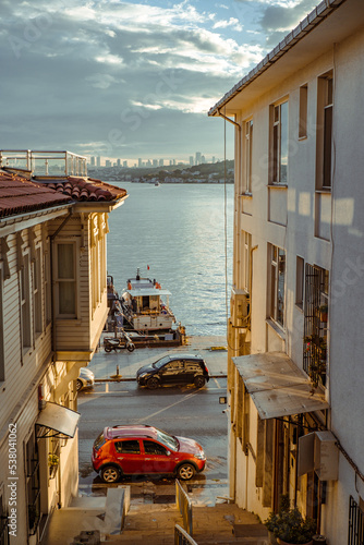 The street that leads to a sea at the end of the road in Istanbul, Beykoz Beach. a beautiful sunset